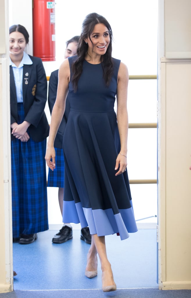For a 2018 reception in Melbourne, Meghan styled this colorblock fit-and-flare Roksanda dress with Stuart Weitzman pumps and Birks jewelry.
