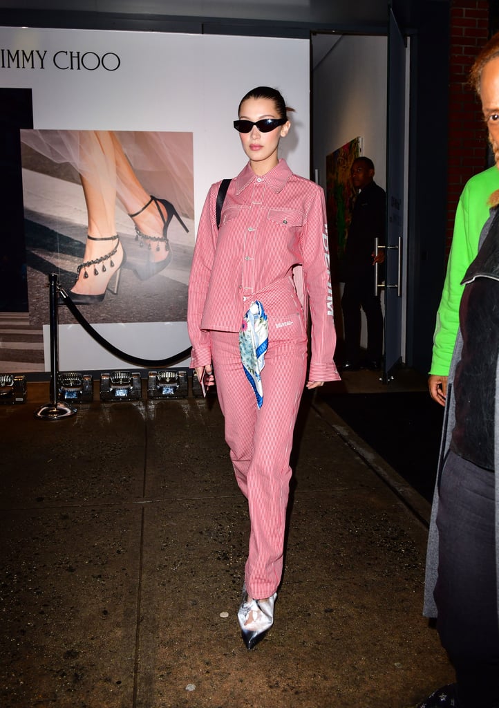 Wearing a pink look straight from the Off-White Pre-Fall 2018 collection. Her PVC pumps were from Off-White's collection with Jimmy Choo.