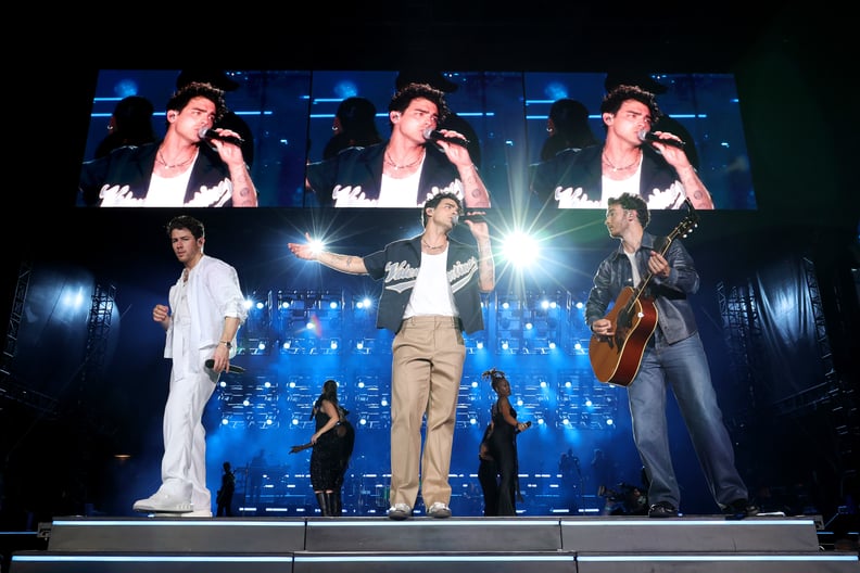 NEW YORK, NEW YORK - AUGUST 12: (L-R) Nick Jonas, Joe Jonas, and Kevin Jonas perform onstage during Jonas Brothers