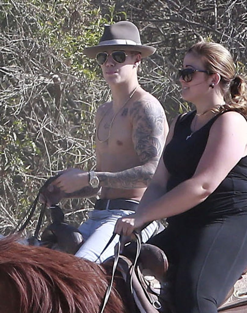Justin Bieber couldn't resist showing off his toned frame when he went horseback riding in LA's Griffith Park on Monday. The young crooner was joined by a group of friends and initially set on his ride in a white top, which he removed in the middle of his ride. Justin apparently liked his horseback adventure, posting shots of himself on Instagram and asking, "Is that young Indiana Jones? #skintightpants #igottachill"
One person who was not part of Justin's horseriding pack was his mom, Pattie Mallette. However, Justin did have his mom by his side on Mother's Day, when they sat courtside at an LA Clippers game and got cute by snapping selfies and sharing laughs.