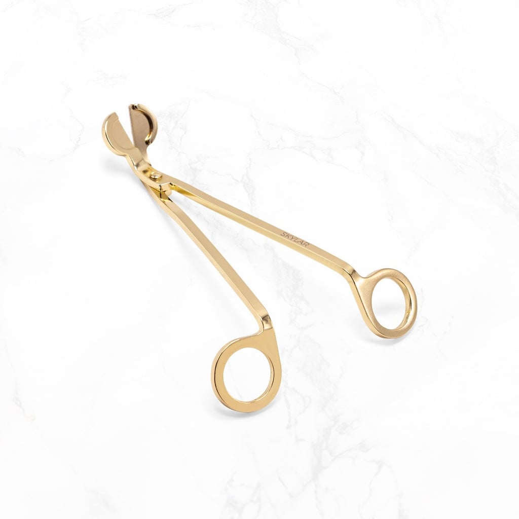 This gorgeous gold Skylar Wick Trimmer ($16) will look great with the rest of the metallic accents in your home.