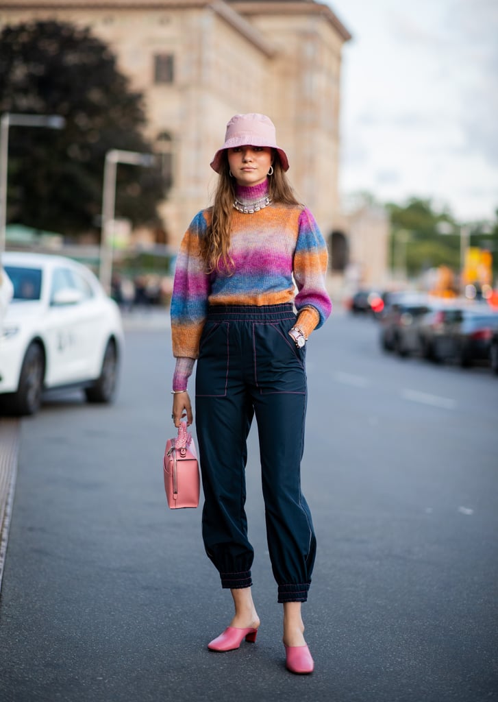What's more fun than a multicolored stripe, pastel accessories, and a bucket hat?