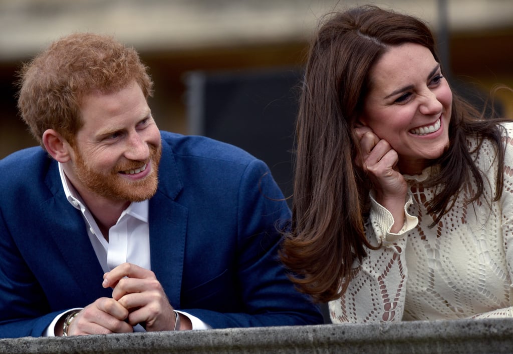 Harry and Kate were all smiles at a Buckingham Palace tea party in London in May 2017.