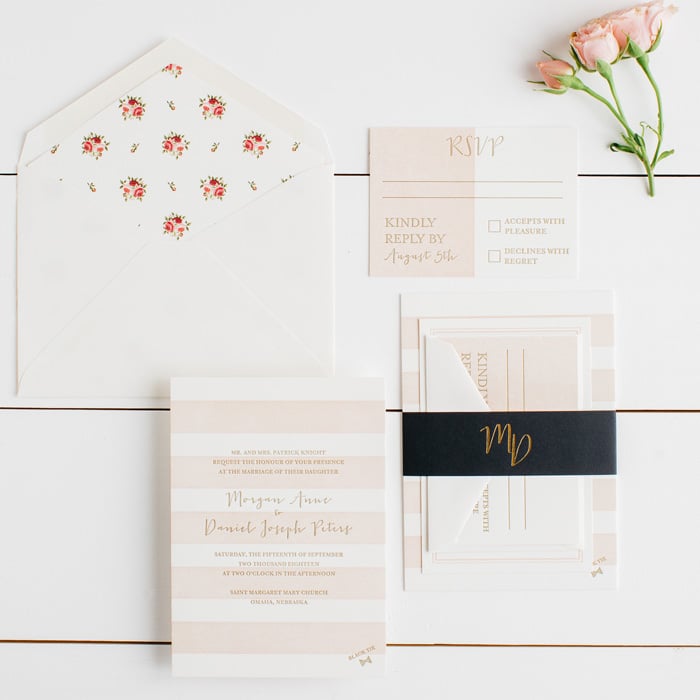 A combination of florals and stripes keep invites playful.