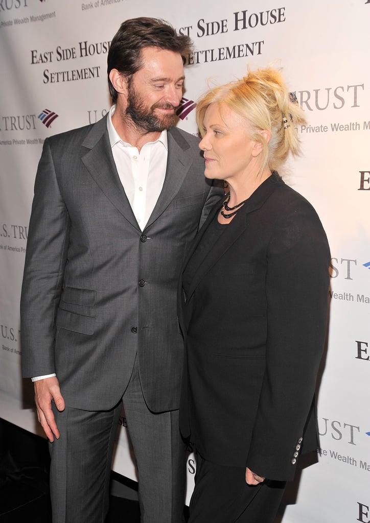 Hugh couldn't keep his eyes off his wife during the opening night of the 57th annual Winter Antiques show in January 2011 in NYC.