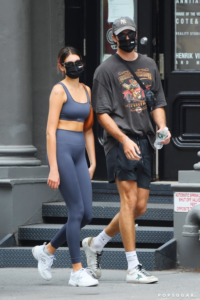 It's looking more and more like Jacob Elordi and Kaia Gerber are an item. On Wednesday, the two were spotted walking to the gym together in New York City, clad in casual workout clothes and face masks. Their day trip comes shortly after fans captured the 23-year-old actor and 19-year-old model taking a stroll and relaxing on a park bench in the city. They were also photographed on a PDA-filled date in NYC earlier this week after recently grabbing a bite to eat at the Malibu, CA, restaurant Nobu.
It's unclear when the pair first struck up a romance, but a source recently told Entertainment Tonight that "things are really great between them," adding, "They've been spending a lot of time together and seem super happy." However, another source told E! that they haven't labeled their relationship quite yet, saying, "Kaia is the one that doesn't want to be in an exclusive relationship right now. She has a lot of projects on her plate and wants her freedom. She does love hanging out with Jacob and they are spending time in New York City for the week while she works." 
Jacob was most recently linked to Euphoria costar Zendaya. They first sparked relationship rumors in August 2019 when they vacationed together in Greece. However, the duo never confirmed their relationship. Jacob also previously dated his Kissing Booth costar Joey King — whom he met on set in 2017 — before they called it quits in April 2019. Kaia, on the other hand, was briefly linked to Cole Sprouse in April of this year, as well as Pete Davidson, whom she dated for three months in 2019. Hopefully, we'll get some official confirmation about Jacob and Kaia's reported romance, but in the meantime, check out photos from their latest outing ahead!

    Related:

            
            
                                    
                            

            Can We Just Refresh Your Memory on How Damn Hot Jacob Elordi Is?
