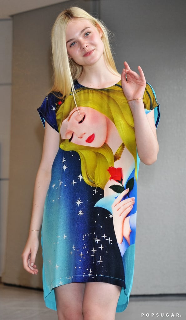 Elle Fanning made her arrival in Tokyo in a Sleeping Beauty dress on Saturday.