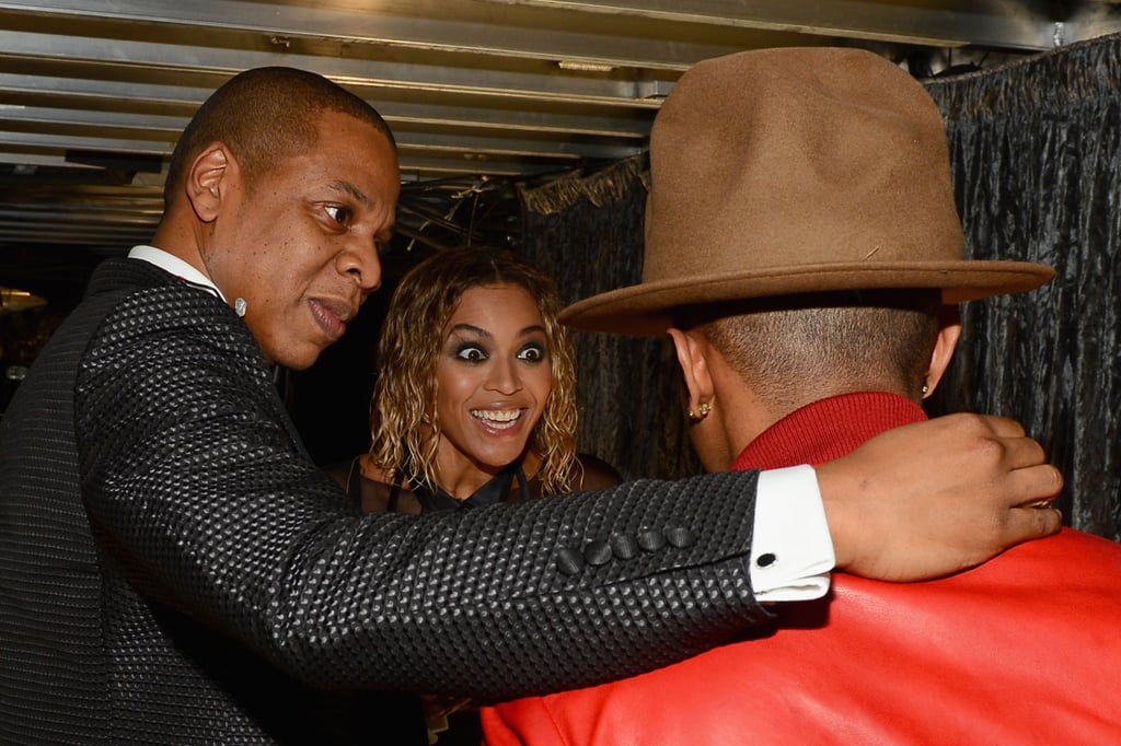 Beyoncé looked excited to see Pharrell's hat at the Grammys.