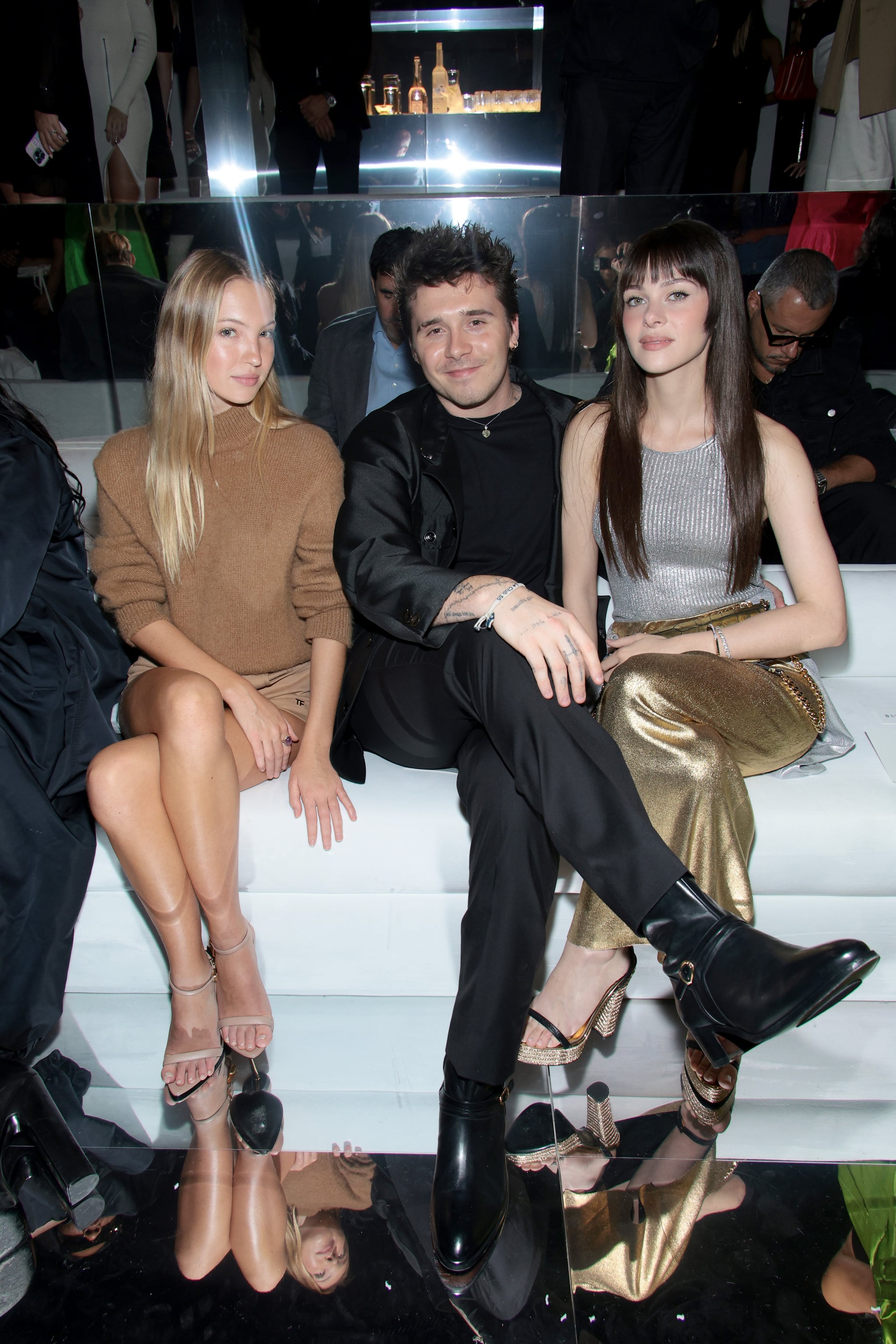 NEW YORK, NEW YORK - SEPTEMBER 14: Lila Grace Moss Hack, Brooklyn Beckham and Nicola Peltz attend the Tom Ford fashion show during September 2022 New York Fashion Week: The Shows at Skylight on Vesey on September 14, 2022 in New York City. (Photo by Dimitrios Kambouris/Getty Images for NYFW: The Shows )