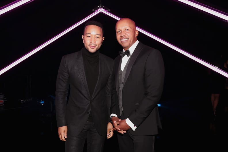 SANTA MONICA, CA - NOVEMBER 11:  2018 E! PEOPLE'S CHOICE AWARDS -- Pictured: (l-r) Recording artist John Legend and People's Champion Award honoree Bryan Stevenson pose during the 2018 E! People's Choice Awards held at the Barker Hangar on November 11, 20