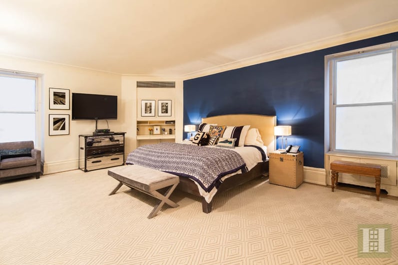 The palatial master bedroom suite has an entire wall of floor-to-ceiling fitted closets, which we know will come in handy with Chastain's busy award show schedule. And then there's the marble bathroom, which features double sinks, a deep soaking tub, and a glass enclosed rain shower.