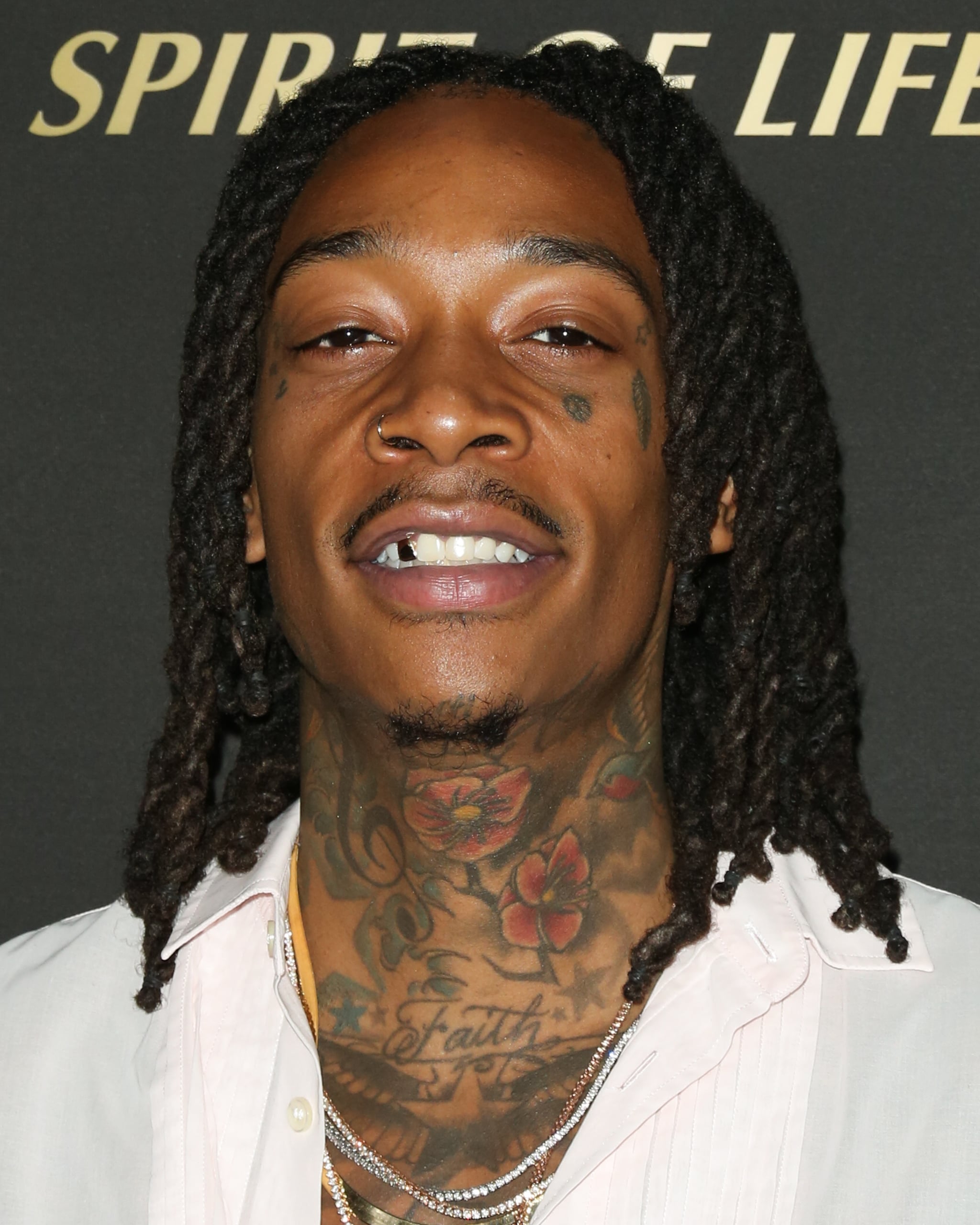 wiz khalifa new face tattoo