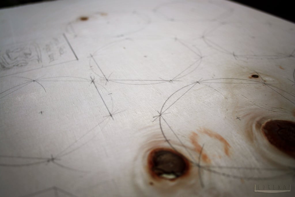"A series of tiles were drawn out onto plywood."