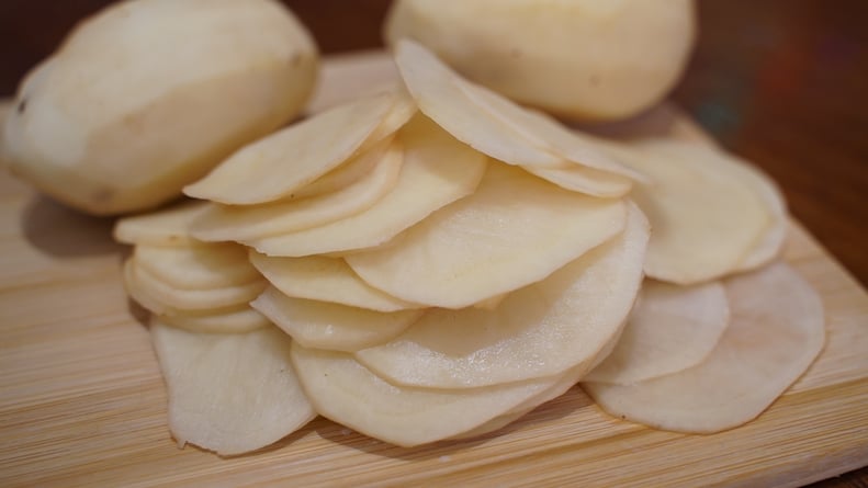 15-hour potatoes recipe: slide potatoes on a cutting board
