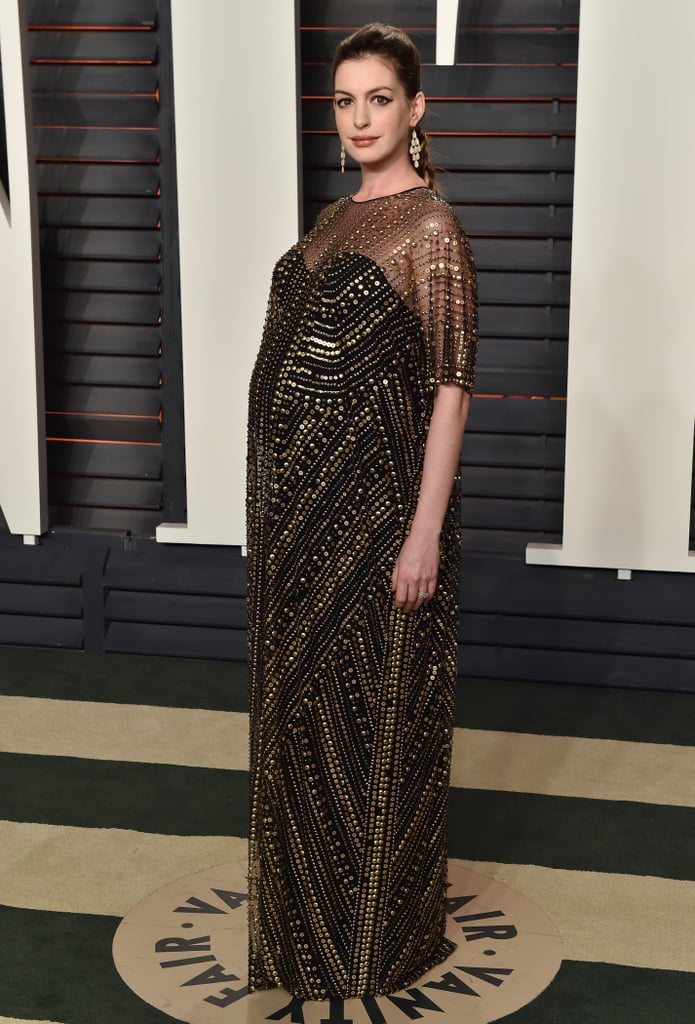 Anne attended the Vanity Fair Oscars party in a Naeem Khan maxi dress, playing up the gilded design with Forevermark jewels.