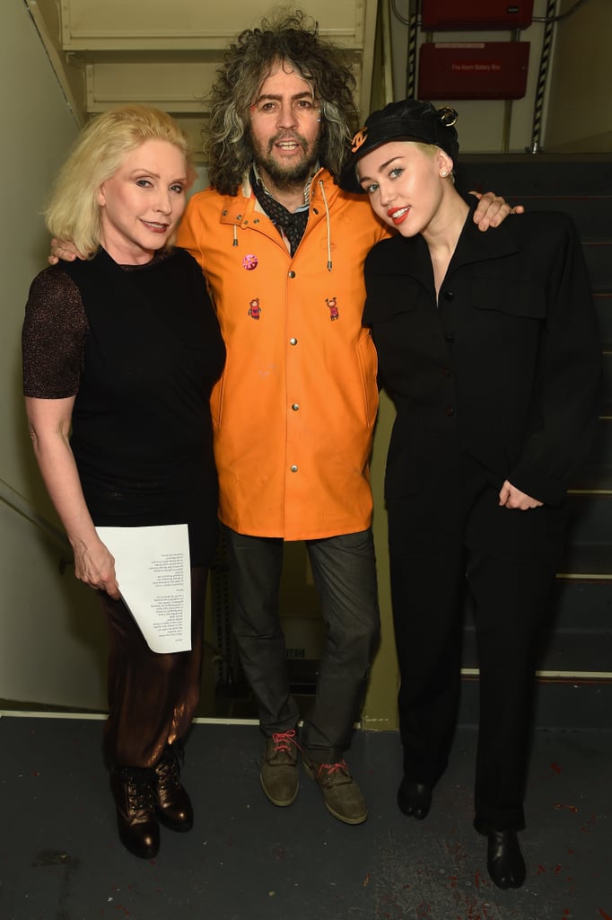 Miley Cyrus got together with Debbie Harry of Blondie and Wayne Coyne of The Flaming Lips during the Tibet House Benefit Concert in NYC on Thursday.