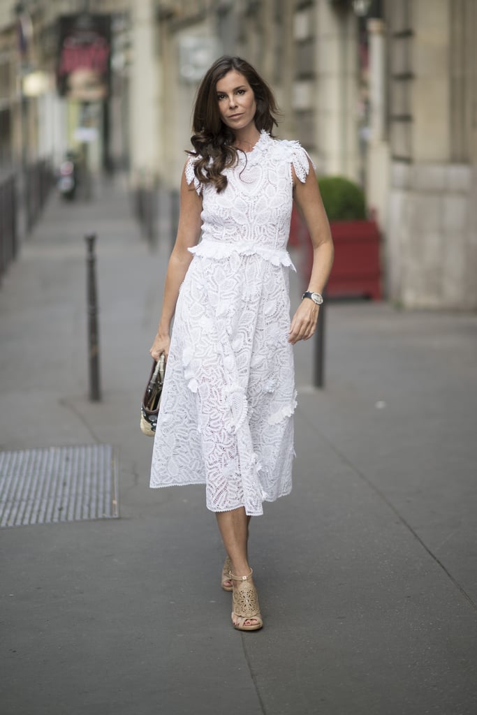 Lacey floral details take this white dress to the next level.