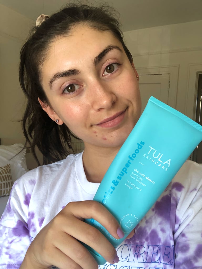 I discovered the brand Tula when I was a junior in college. I had a friend who was very open about her struggle with acne and had documented her skin progress while using the regimen of products on Instagram. That was all of the convincing I needed to give it a try — after all, nothing was working. I still remember the day when bought my first bottle of the Tula cleanser off Amazon and threw out my other face washes as soon as it arrived. Years later, I've gone through countless bottles of the stuff. 
What I first loved — and still do — about the cleanser is how gentle it is on the skin. With my combination skin type, most cleansers were either too harsh and drying or not effective enough. I can use it morning and night and it still doesn't leave my skin feeling parched or tight. It has a refreshing gel consistency that lathers into a light foam and removes makeup and dirt from the face with ease. It's loaded with good-for-you ingredients like chicory root to calm inflammation, turmeric root and blueberries for antioxidants, lactic acid to gently exfoliate, and the brand's signature probiotics.