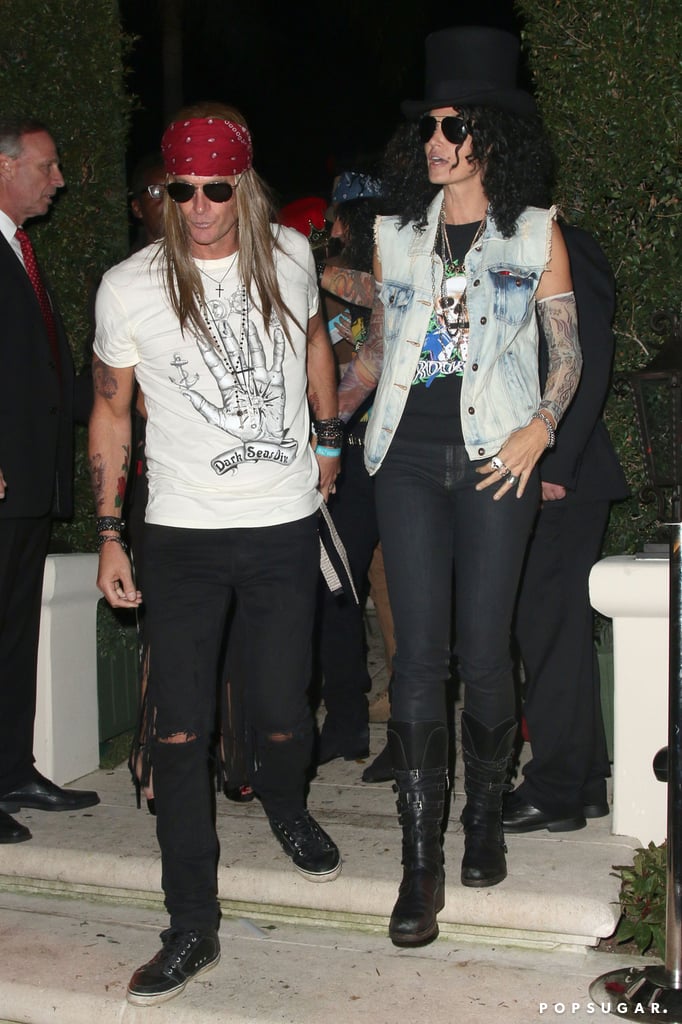 Cindy Crawford and Rande Gerber were impeccably dressed as Axl Rose and Slash for an LA party in 2013.