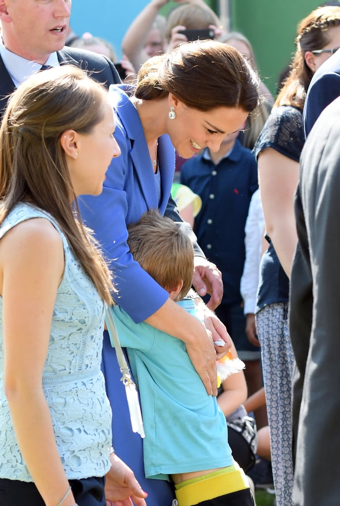 Kate-Middleton-Hugging-Kids-Germany-July-2017.jpg