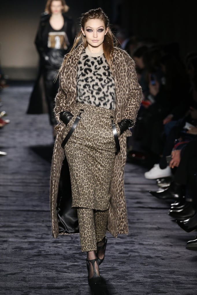 The model mixed and matched different color leopard prints on the Max Mara runway.