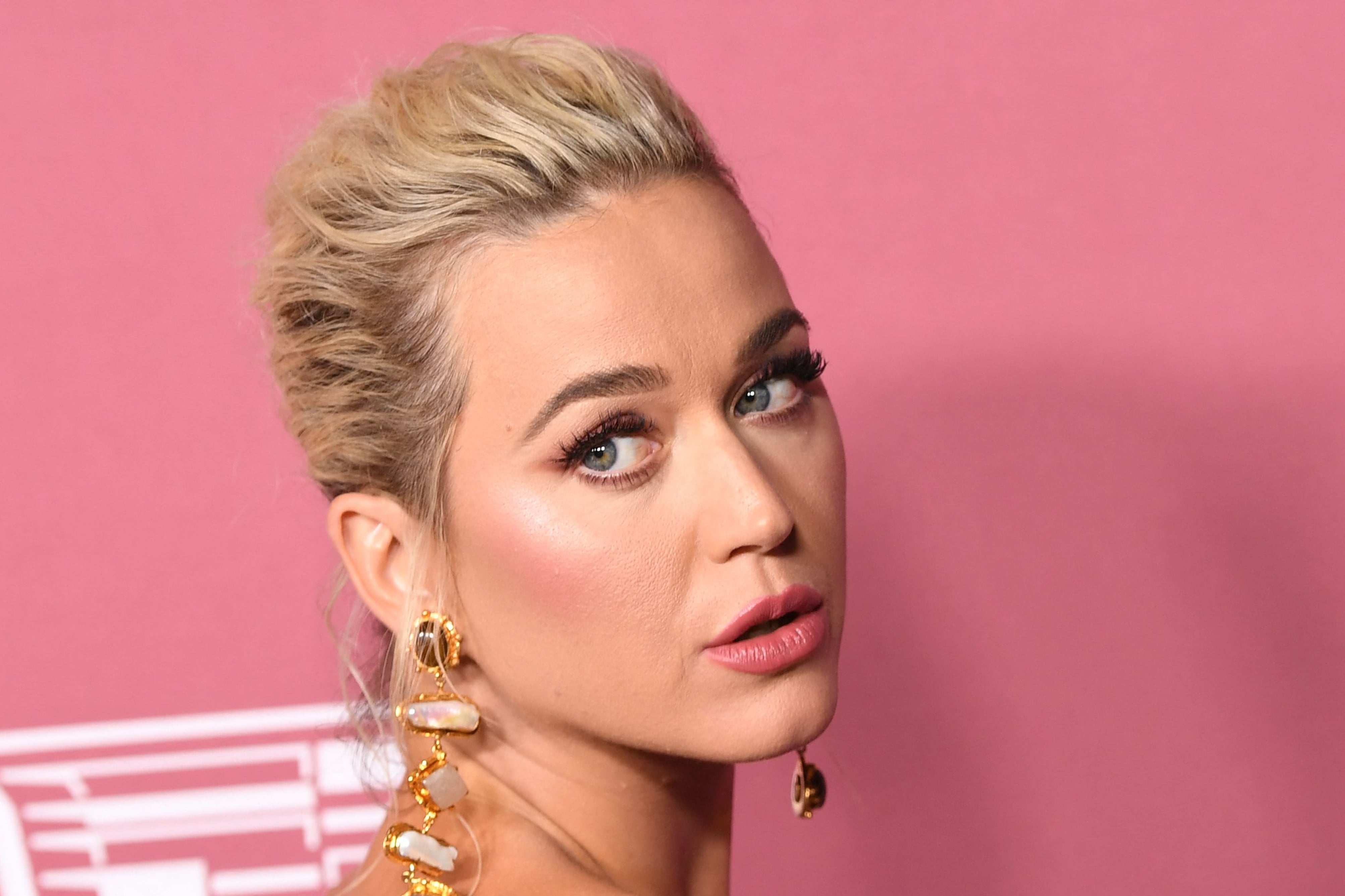 Katy Perry Channels Barbiecore in Pink Latex Dress and Coat