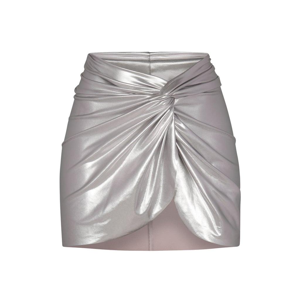 Skims Metallic Swim Sarong Mini Skirt in Nickel ($78)