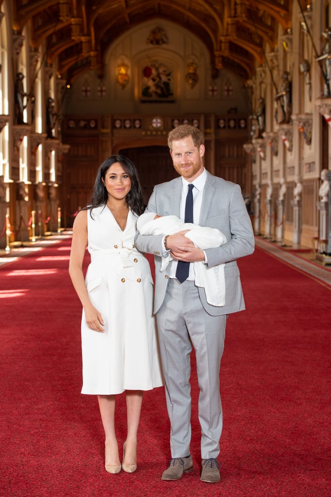 Meghan Markle Wearing a White Sleeveless Trench Dress For Baby Portraits at Windsor Castle
