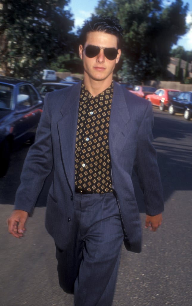 Tom Cruise looked suave in a blue suit and printed shirt on his way into Sean Penn's wedding in August 1985.