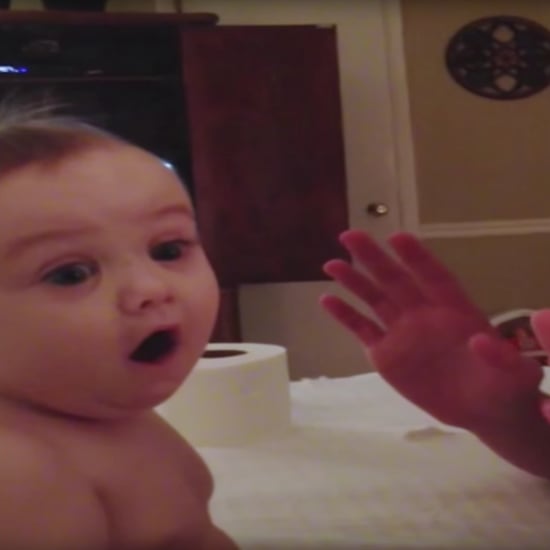 Baby Amazed at His Brother's Toilet Paper Magic Trick
