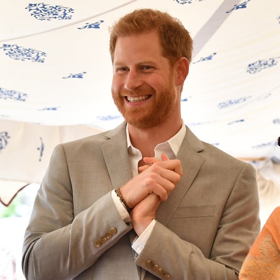 Prince Harry Fixing Meghan Markle's Hair at Cookbook Launch