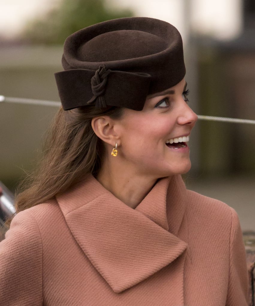 Kate's deep brown Betty Boop hat from Lock & Co added a rich contrast to her coat at the Cheltenham Festival in 2013.