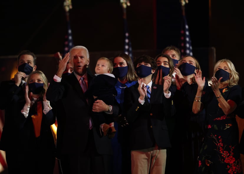 WILMINGTON, DELAWARE - NOVEMBER 07:  President-elect Joe Biden and family watch fireworks from stage after Biden's address to the nation from the Chase Center November 07, 2020 in Wilmington, Delaware. After four days of counting the high volume of mail-i