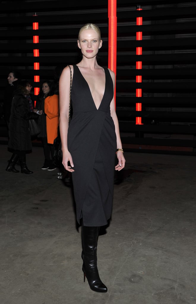 Anne Vyalitsyna's plunging black dress was juxtaposed via black knee-high Christian Louboutin boots at Sally Lapointe.
Anne Vyalitsyna's plunging black dress was juxtaposed via black knee-high Christian Louboutin boots at Sally Lapointe.