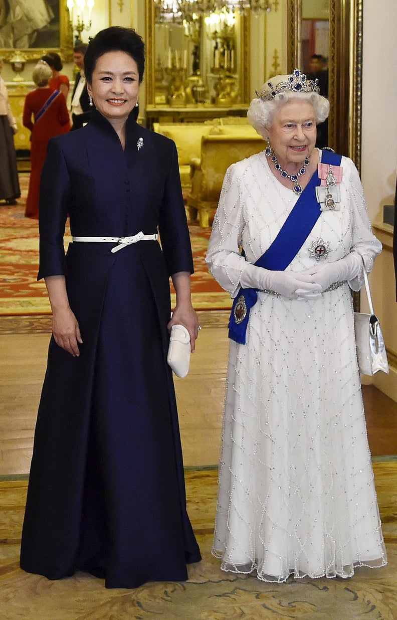 Peng Pulled an Olivia Palermo-Like Belt Trick When She Met the Queen of England