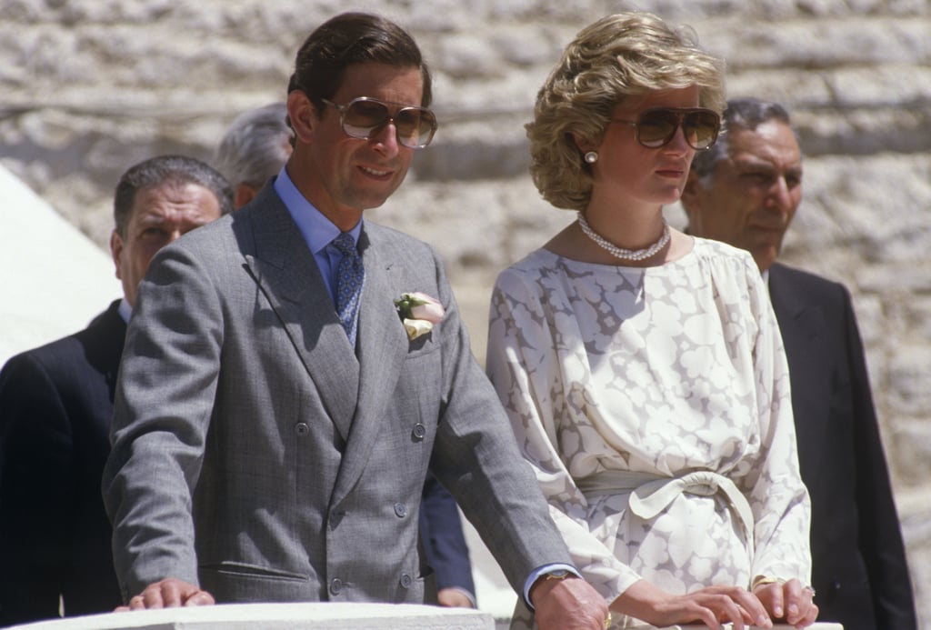 Princess Diana opted for the brown pair of aviators while on tour in Italy, styling the shades with a simple floral day dress, belted in at the waist.