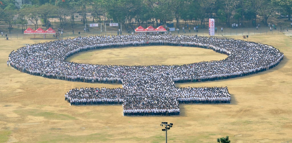 In the Philippines, people gathered to form a human woman symbol.