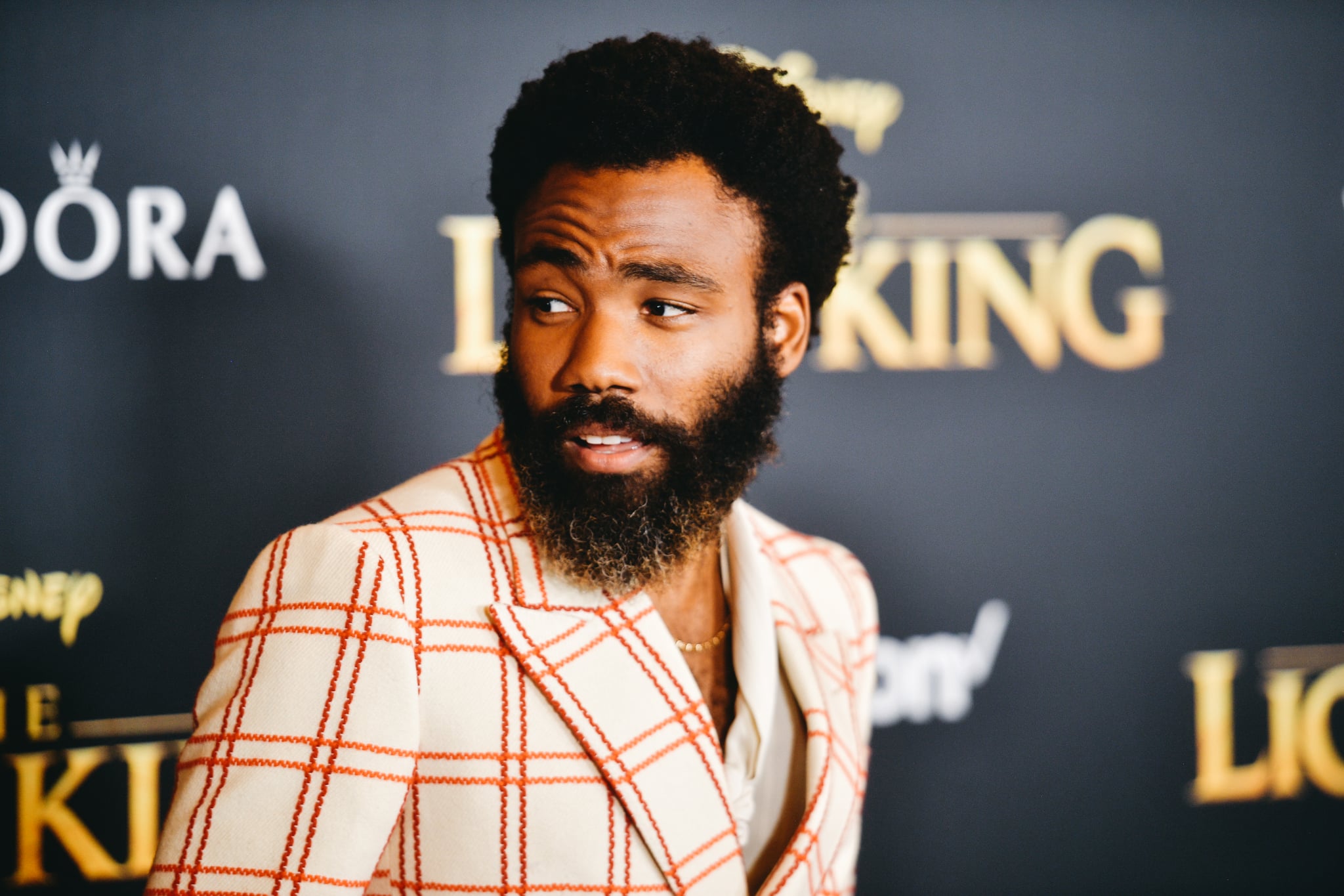 HOLLYWOOD, CALIFORNIA - JULY 09: (EDITORS NOTE: Image has been edited using digital filters) Donald Glover attends the premiere of Disney's 