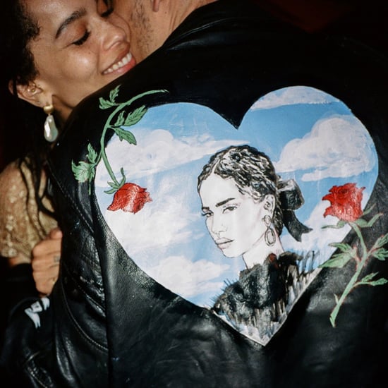 Karl Glusman Wears Leather Jacket With Zoë Kravtiz's Face