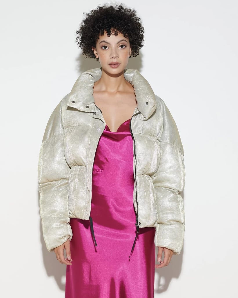 "Puffers are back in a big way this season. I love pairing them back to unexpected pieces like slip dresses and lace up boots. I also think they make the ideal gift since they are stylish and functional, and this Apparis Paula Glitter Jacket ($310) is the perfect iteration." — DAC