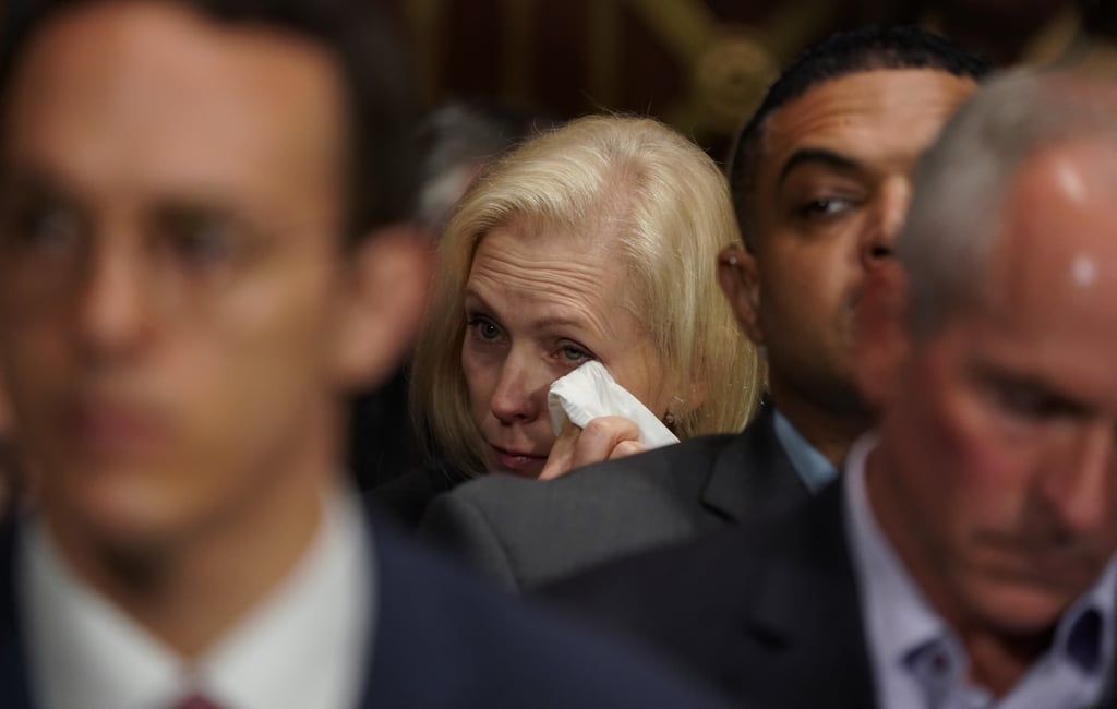 Senator Kirsten Gillibrand of New York cries during Ford's testimony.
