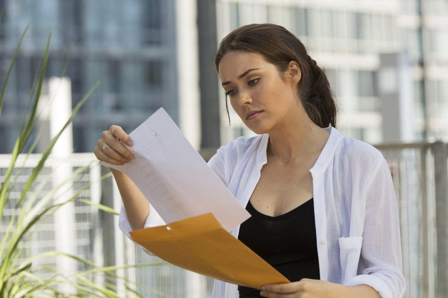 Liz (Megan Boone) finds what's surely an interesting document.