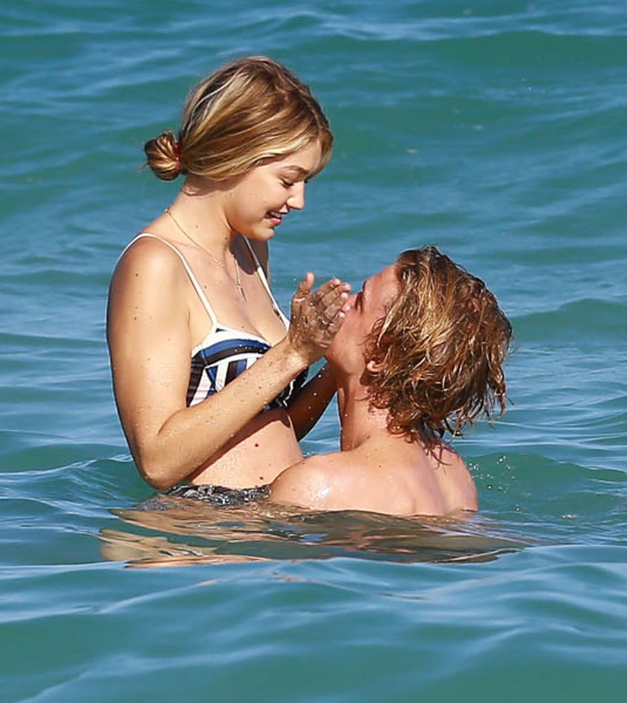 Former couple Gigi Hadid and Cody Simpson engaged in playful PDA while splashing around in Miami in March 2015.