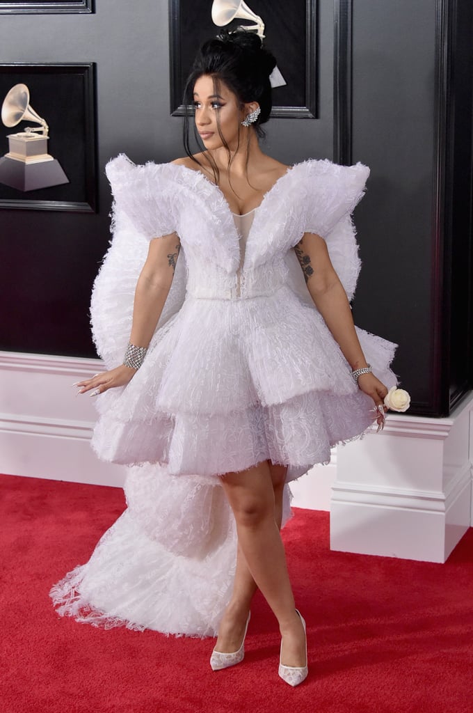Wearing an angelic Ashi dress and Christian Louboutin heels to the Grammys.