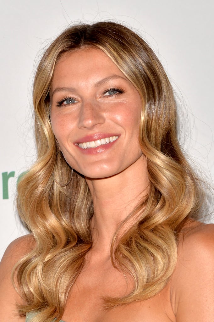 Gisele paired a sheer peachy lip with loose waves at the Save the Rainforest Gala.
