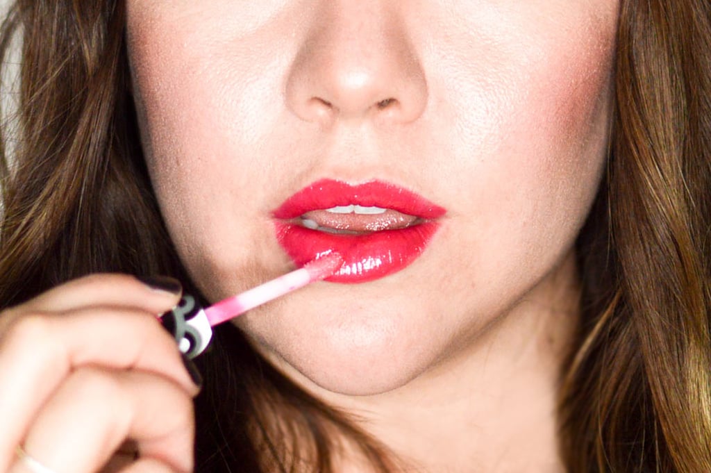 Next, apply an iridescent gloss, like BareMinerals Marvelous Moxie Lipgloss in Hypnotist ($18), for that eye-catching finish.