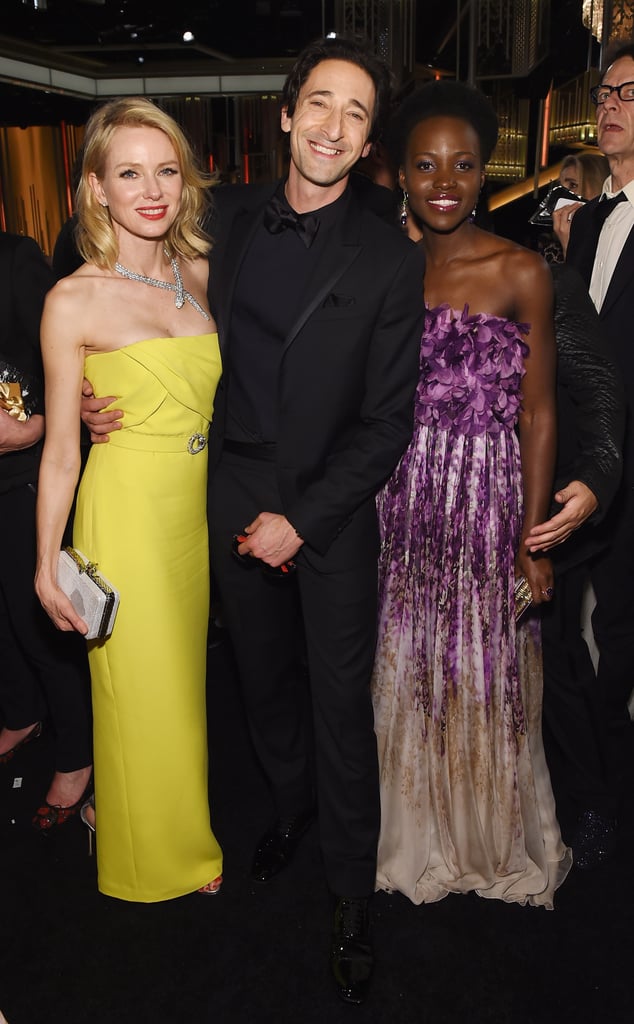 Adrien Brody was in the middle of a gorgeous sandwich with Naomi Watts and Lupita Nyong'o.