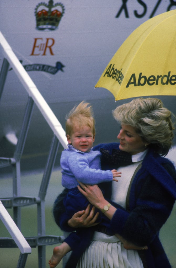 Diana carried Harry off the plane at Aberdeen Airport in September 1985.