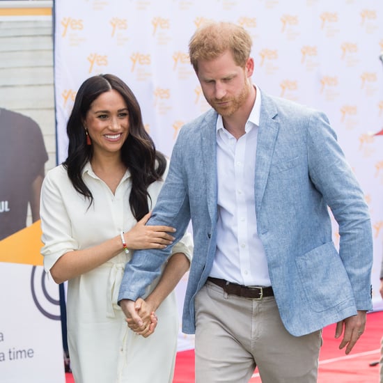 Meghan Markle Holds Hands With Prince Harry in a White Dress