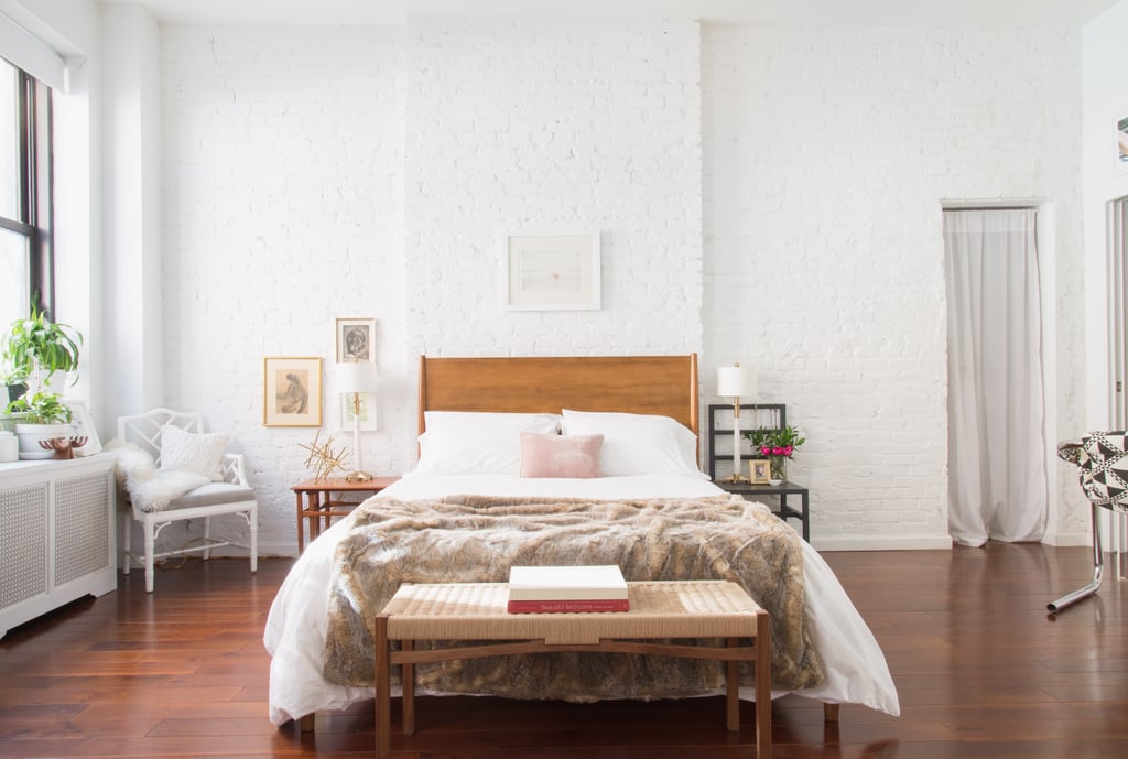 Homepolish interior designer Julia Montanez decided to center her bed within the 400-square-foot studio.